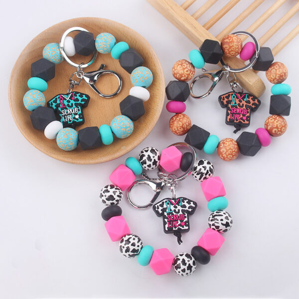 Wholesale Cartoon Nurse Uniform Silicone Beaded Wrist Keychain