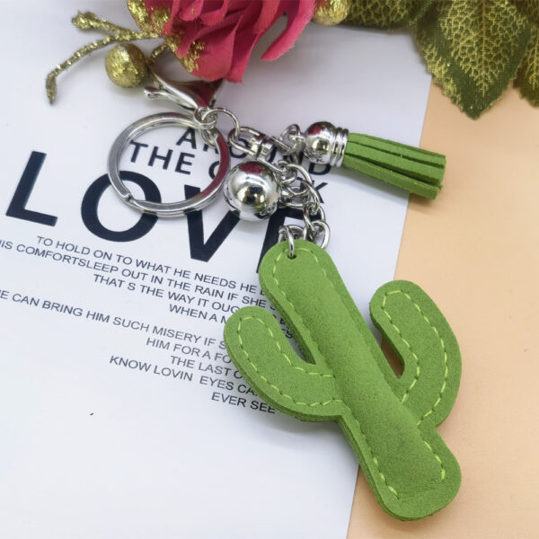 O1CN012cPuQp1a87Td9SanZ_2214423013284-0-cib Wholesale Hot Diamond Cactus Tassel Inlaid Diamond Zinc Alloy Keychain