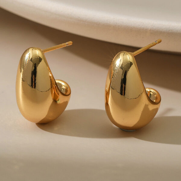 O1CN012rc4C61EhSQ2Nt07f_2210915660383-0-cib Wholesale C Shape Pea Gold Plated Earrings
