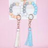 O1CN012zB0q21bFjd9nry0N_2857743436-0-cib-1 Wholesale Wood Imitation Silicone Beads Tassel Wrist Keychain