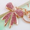 O1CN013ojRmw1anL7AVCPia__2208142583374-0-cib Wholesale Alloy Rhinestone Bow Keychain