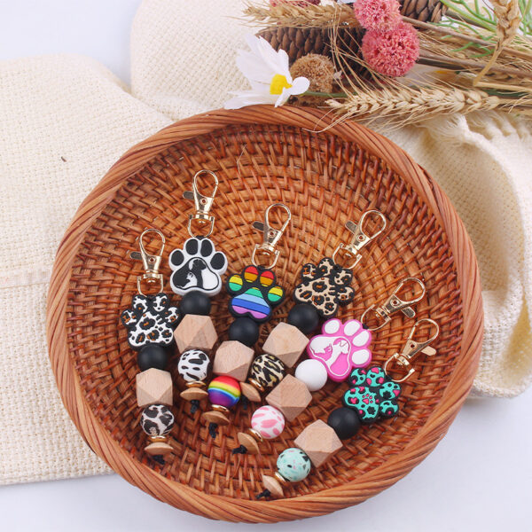 O1CN0146tvxl1NrNm0OIt5r_2214899881623-0-cib Wholesale Cartoon Dog Claws Pure Handmade Silicone Beaded Keychain