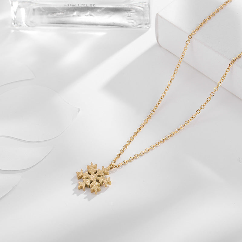 Wholesale Titanium Steel Color Gold Frosted Small Snowflake Necklace