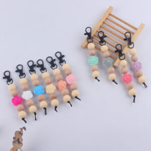 O1CN014YLuKT1NrNe5FsTGu__2214899881623-0-cib Wholesale Silicone Rose Wood Beads Beaded Keychain