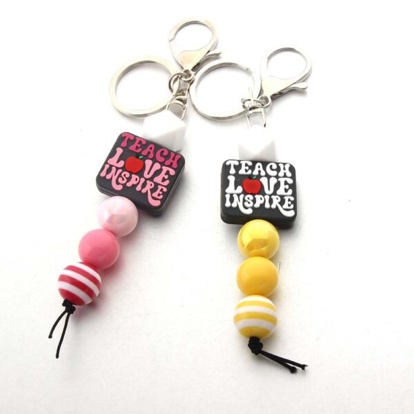 O1CN01590Tj41bYW508YqoD_2216822363477-0-cib Wholesale Cartoon Silicone Beads Acrylic Beads Teacher Keychain