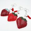 O1CN015PDbXM2Jx6V0pAy1c_2922119487-0-cib-1 Wholesale Velvet Tassel Strawberry Hot Diamond Keychain