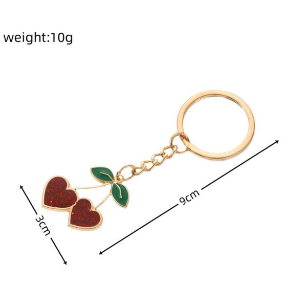 O1CN015Qxhwx1bFjfUO4bGh_2857743436-0-cib Wholesale Lovely Peach Cherry Alloy Key Chain