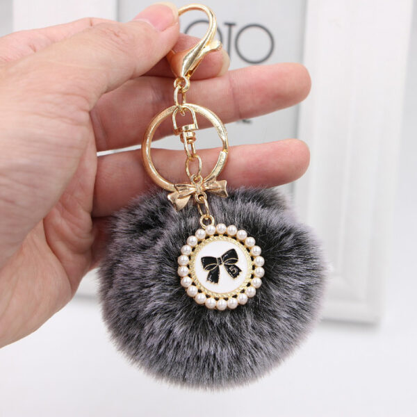 O1CN015jAoqw1X3abF3AAPy_2038122868-0-cib Wholesale New Bow Tag Imitation Rex Rabbit Fur Plush Ball Keychain
