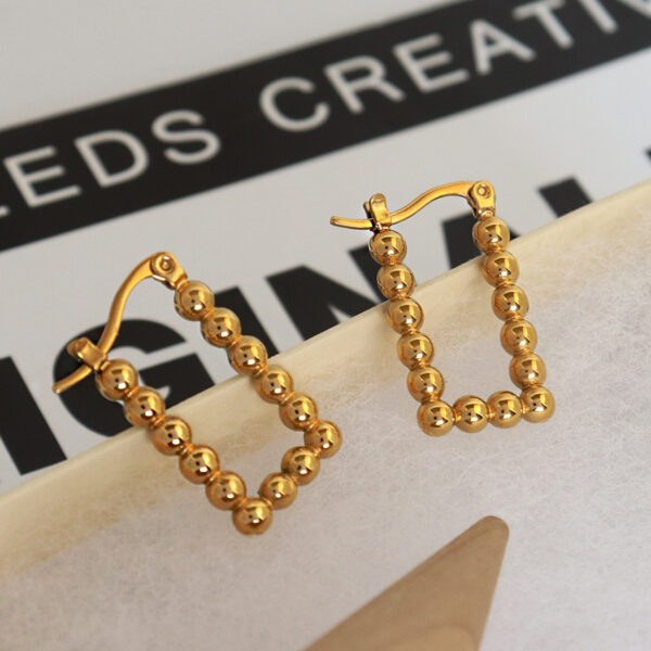 O1CN015jw3of1VHfjU8SB2M_4112122628-0-cib Wholesale Round Bead Geometric Earrings
