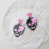 O1CN0167S95E1tTALQ43aSS__2207988525902-0-cib Wholesale Acrylic Pink Skull Earrings Engraved Graffiti Heart