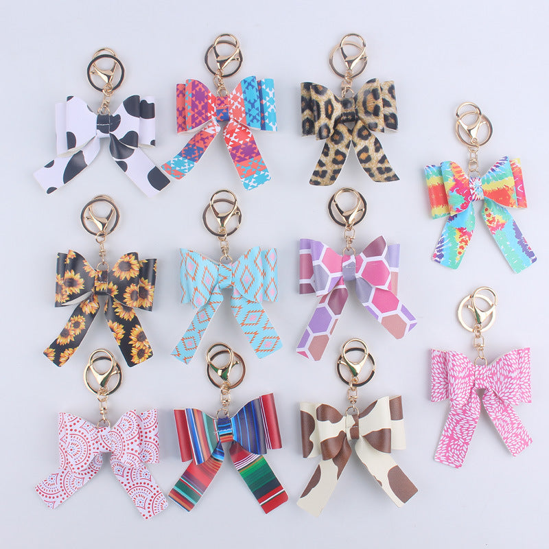Wholesale Cartoon Aztec Color Bow Leather Keychain