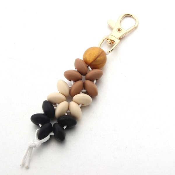O1CN016ua9Z11bYW5KRHDQE_2216822363477-0-cib Wholesale Floral Silicone Bead Keychain