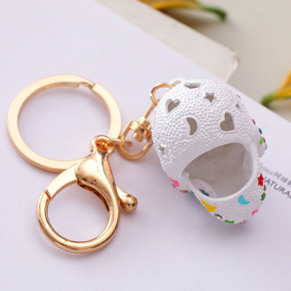 O1CN0171X8YL24ETLxVmvSW_2208216907359-0-cib Wholesale Diamond Spray Painted Skull Alloy Keychain