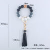 O1CN0177VbYG1NrNf2l8BSv_2214899881623-0-cib-2 Wholesale Silicone Beaded Tassel Wrist Keychain