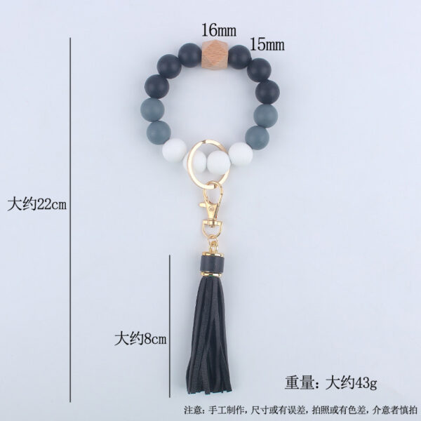 O1CN0177VbYG1NrNf2l8BSv_2214899881623-0-cib-2 Wholesale Silicone Beaded Tassel Wrist Keychain