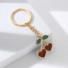O1CN0178bIhx1bFjfPzf7ie__2857743436-0-cib_eee2b4eb-902e-4945-8265-2fcd430cd368 Wholesale Lovely Peach Cherry Alloy Key Chain