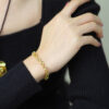 Wholesale Alloy Gold-plated Simulation Bracelet with High-end Feel, Light Luxury, Four Leaf Lucky Grass Retro Bracelet