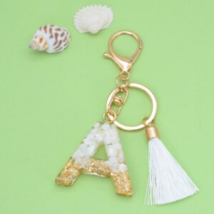 O1CN017HgucF1sAYZ38y6pk__3429435726-0-cib Wholesale White Tassel 26 Letter Crystal Resin Keychain