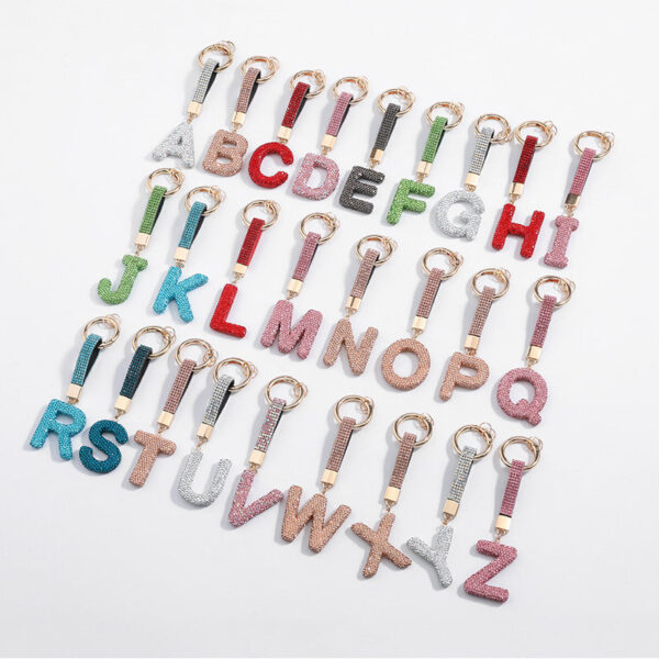 Wholesale Pottery Clay Water Diamond Alloy Dot Diamond Letter Keychain