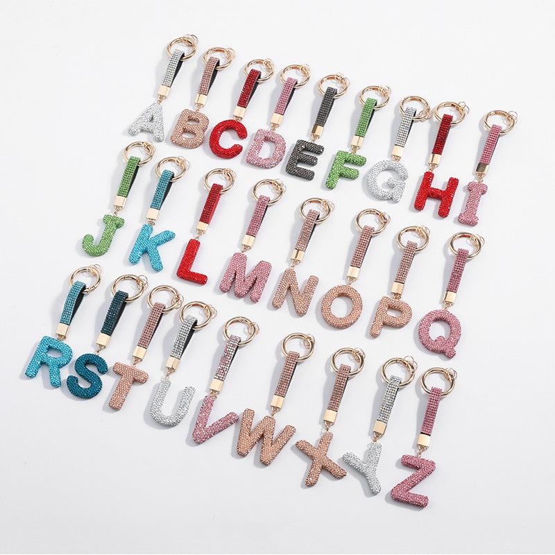 Wholesale y Clay Water Diamond Alloy Dot Diamond Letter Keychain