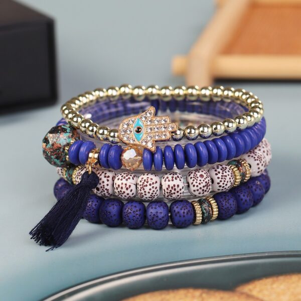 O1CN017SOvsB1LkOeGrDuOI_2215904591337-0-cib Wholesale Tassel Demon Palm Pendant Multi Layered Pendant Glass Elastic Bracelet