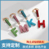 Wholesale Pottery Clay Water Diamond Alloy Dot Diamond Letter Keychain