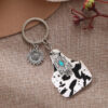 Wholesale Vintage Farm Sign Cow Hair Cow Pattern Alloy Cross Keychain