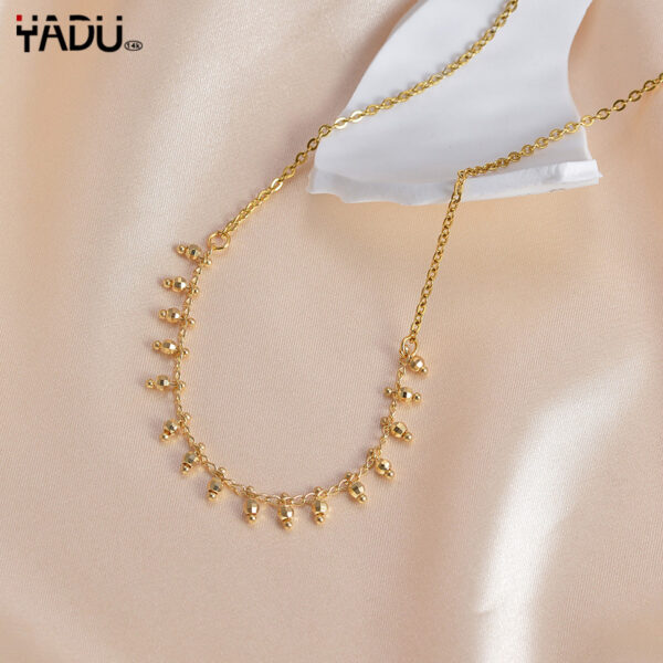 O1CN018CLXa91v0tAZYYfEA_2212884106111-0-cib Wholesale Titanium Steel Irregular Round -brand Pendant Three -layer Necklace