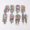 O1CN018DvcqW2LwImq8YbP1_3077749756-0-cib Wholesale Colorful Diamond Letter Tassel Brooch