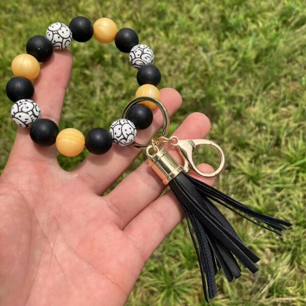 O1CN018lmBH81FT5dXnCPh7_2698260487-0-cib-2 Wholesale Leopard Sunflower Tassel Silicone Beaded Wrist Keychain
