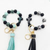 Wholesale Leopard Cross Silicone Beaded Tassel Wrist Keychain