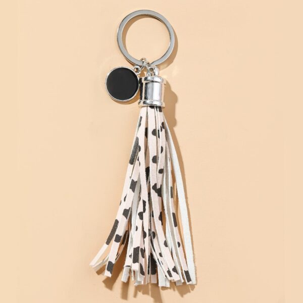 O1CN0192GPQT1bFjfKVfxTi_2857743436-0-cib Wholesale PU Cow Pattern Tassel Keychain