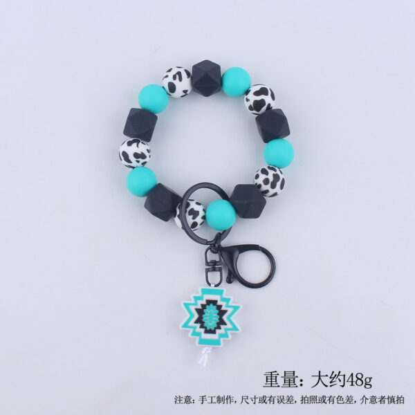 Wholesale Cartoon Bull Head Aztec Cross Silicone Beaded Wrist Keychain