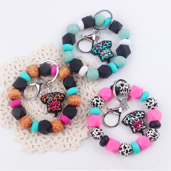Wholesale Cartoon Nurse Uniform Silicone Beaded Wrist Keychain