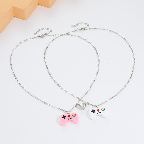 O1CN019Fe8Xw1WVhMwqP0nM_3379762794-0-cib Wholesale Resin Creative Game Machine Handle Magnetic Attraction Pendant Necklace