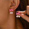 O1CN019Kc0dH1TX7xVBLjja_2208880022391-0-cib Wholesale Simple Bow Inlaid Pearl Earrings