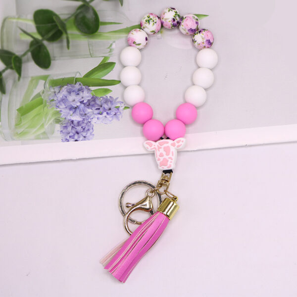 O1CN019fo3Gz1eDqyfPIErX_2216524353838-0-cib Wholesale Cow Pattern Cow Head Silicone Beaded Wrist Keychain