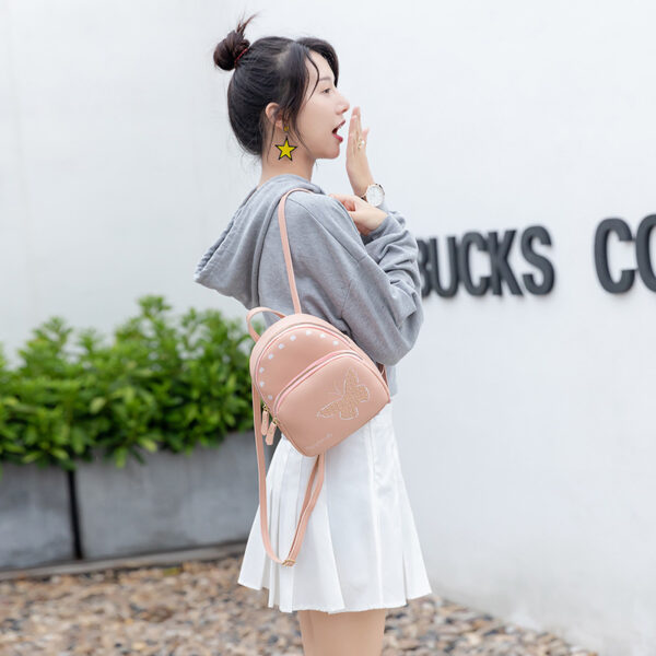 O1CN019t94Yj1xqInwccXku_3360526494-0-cib Wholesale Rivet Butterfly Decorative Shell PU Small Backpack