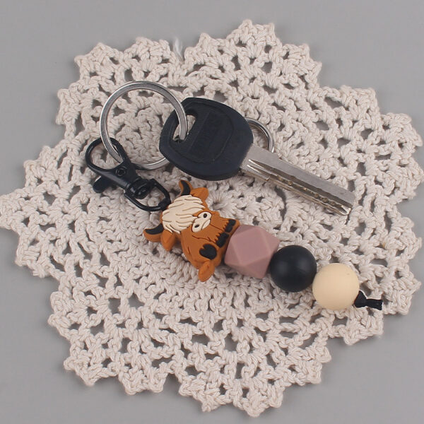 O1CN019vKJFk1NrNfAESr2C_2214899881623-0-cib Wholesale Cartoon Cow Elk Silicone Handmade Beaded Keychain