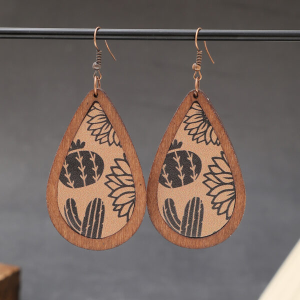 O1CN019w9Rd61ftMTlSLswq_3172764064-0-cib Wholesale Western Style Cow Head Retro Aztec Pattern Cow Pattern Leather Wood Chip Earrings