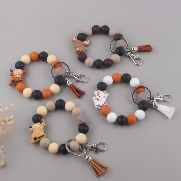 O1CN01ACj60Y1NrNff5A9gn_2214899881623-0-cib Wholesale Silicone Cartoon Beads Keychains