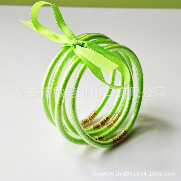 O1CN01ANHeWM2E5RviNX4v3_2210959578693-0-cib-1 Wholesale Silicone Women's Bow Gold Powder Bracelet