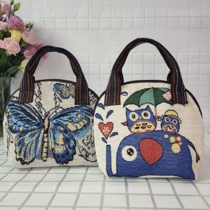 Wholesale Cotton and Hemp Embroidered Shell Type Portable Bag