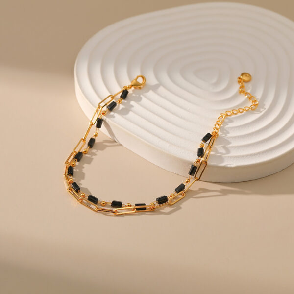 O1CN01AZ3pAX1EhSShGrn4W_2210915660383-0-cib Wholesale Paper Clip Chain Black Glass Diamond Multi-layer Copper Plated 18K Real Gold Bracelet