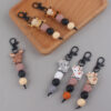 O1CN01AdvXK11NrNf6G61XP__2214899881623-0-cib Wholesale Cartoon Cow Elk Silicone Handmade Beaded Keychain