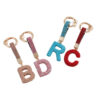 Wholesale Pottery Clay Water Diamond Alloy Dot Diamond Letter Keychain