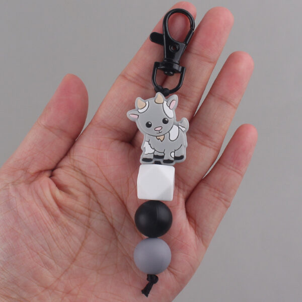 O1CN01Av7y9u1NrNf7SmtLD_2214899881623-0-cib Wholesale Cartoon Cow Elk Silicone Handmade Beaded Keychain