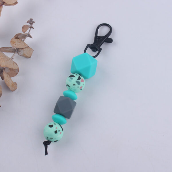 O1CN01AwDs4y1NrNe82tCoP_2214899881623-0-cib Wholesale Silicone Leopard Beaded Keychain