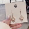 O1CN01BFCrdQ1o5k0mPhpoS_2200827845174-0-cib Wholesale 925 Silver Needle Champagne Color Pearl Earrings
