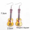 O1CN01BGMedz2CFriOxloOn_2207539588445-0-cib Wholesale Music Instruments Electronic Guitar Acrylic Earrings